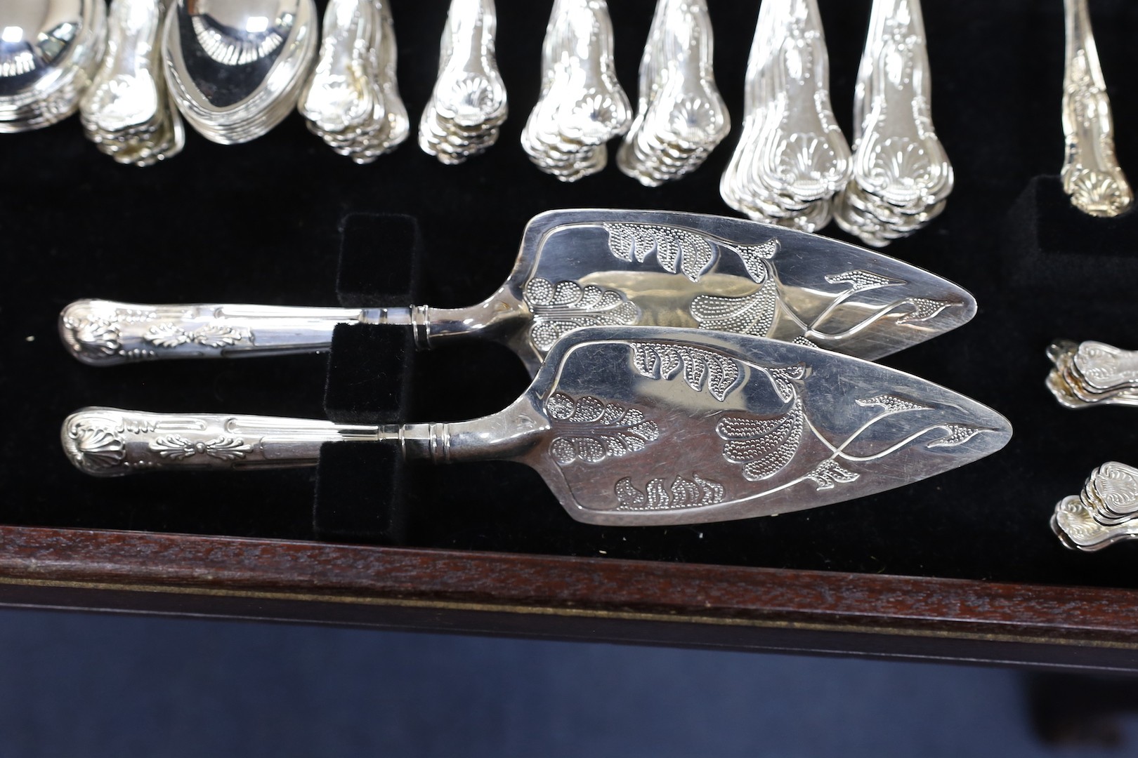 A leather inset canteen of silver plated flatware